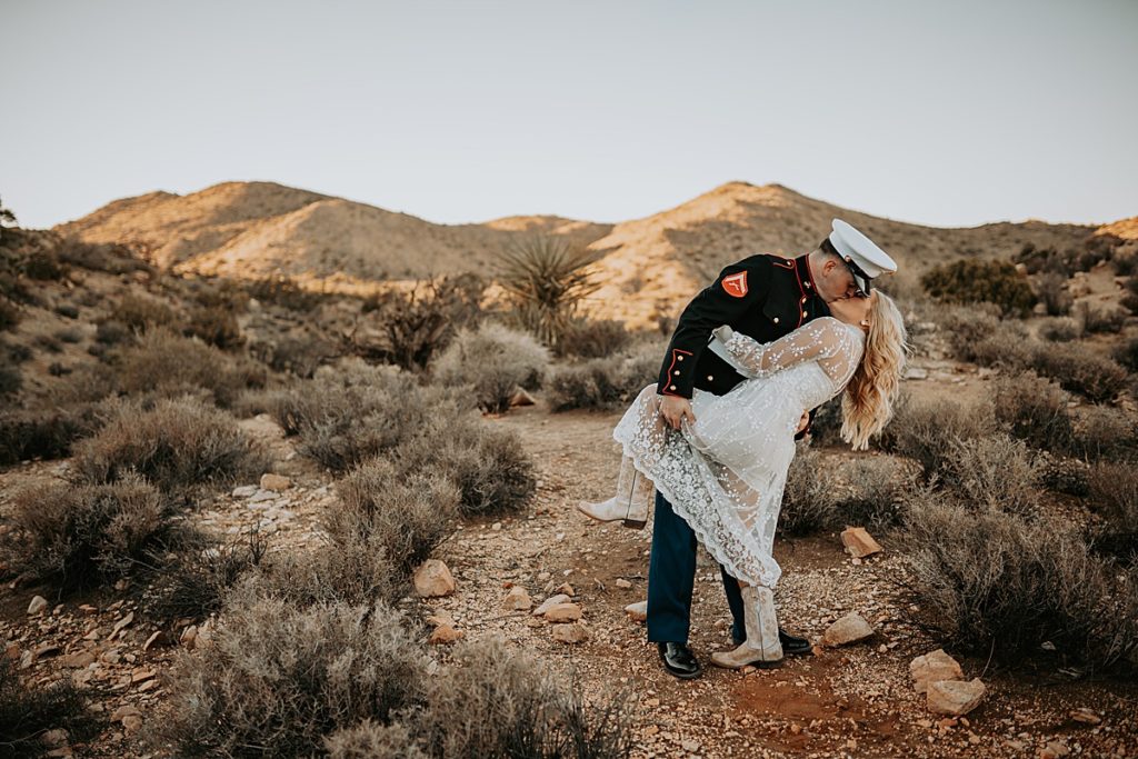 couple dancing in joshua tree during engagement session