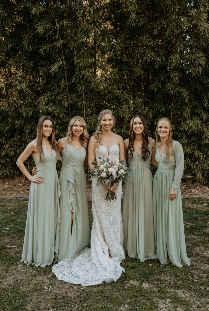 bridesmaids and bridal party photos with green long dresses