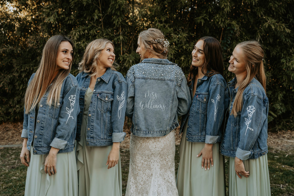 bridemaids and bride photos with custom jean jackets