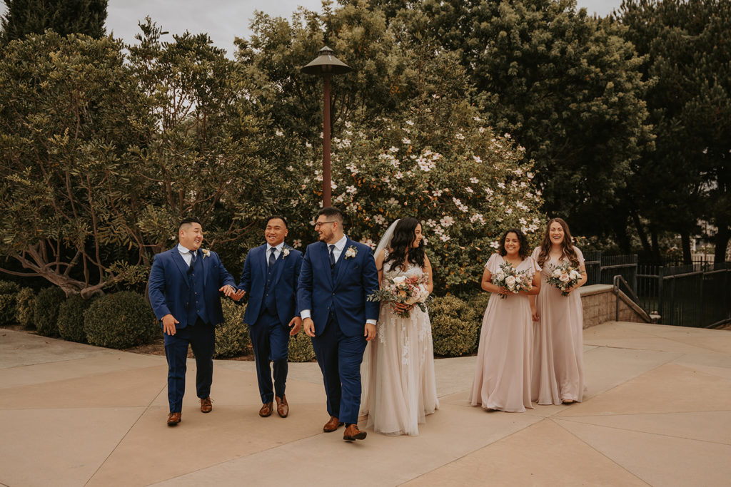 California bride and groom photos on golf course and bridesmaids and groomsmen