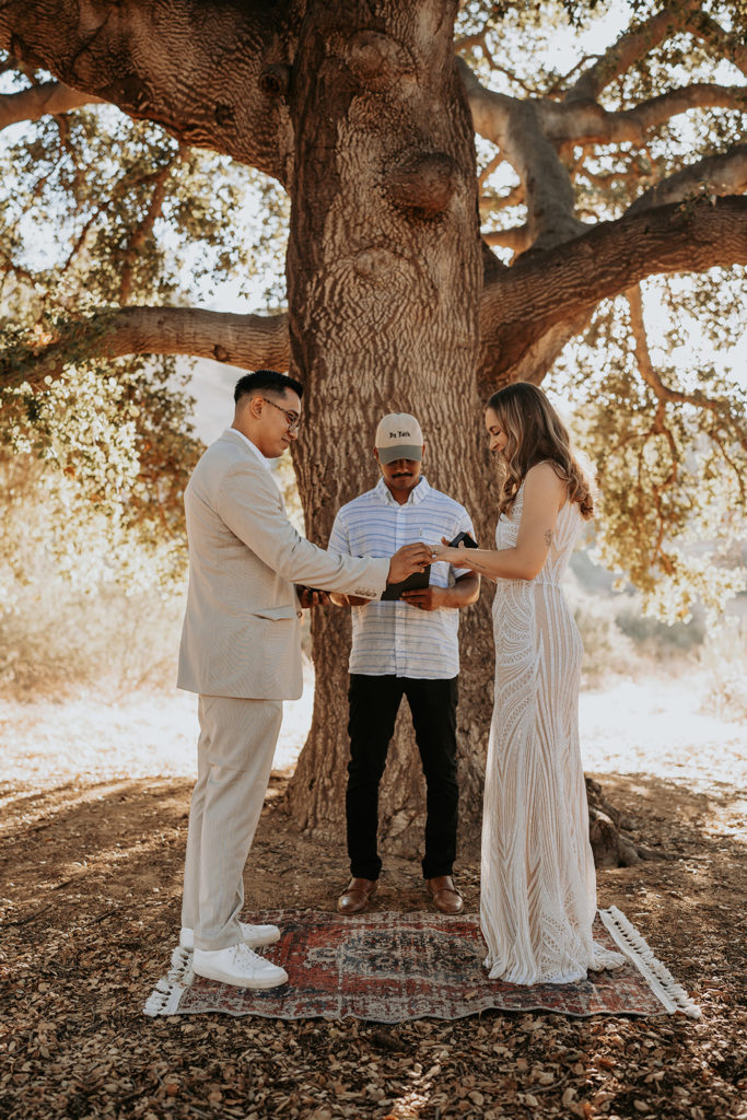 boho wedding ceremony under tree