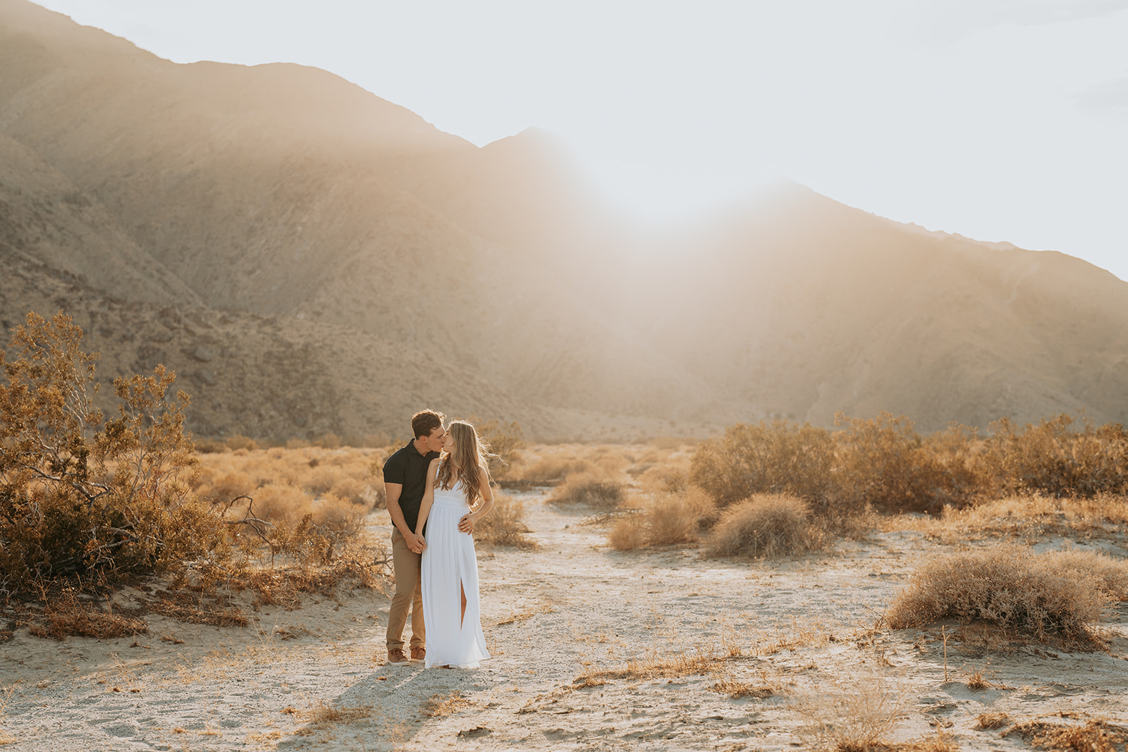 couple posing in the desert