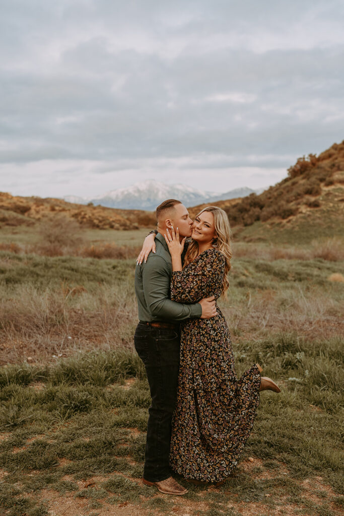 couple posing for their engagement photoshoot in redlands california