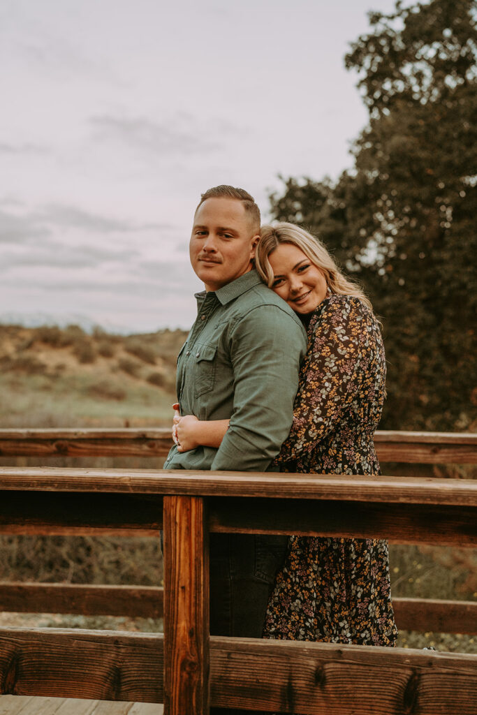 couple posing for their engagement photoshoot in redlands california