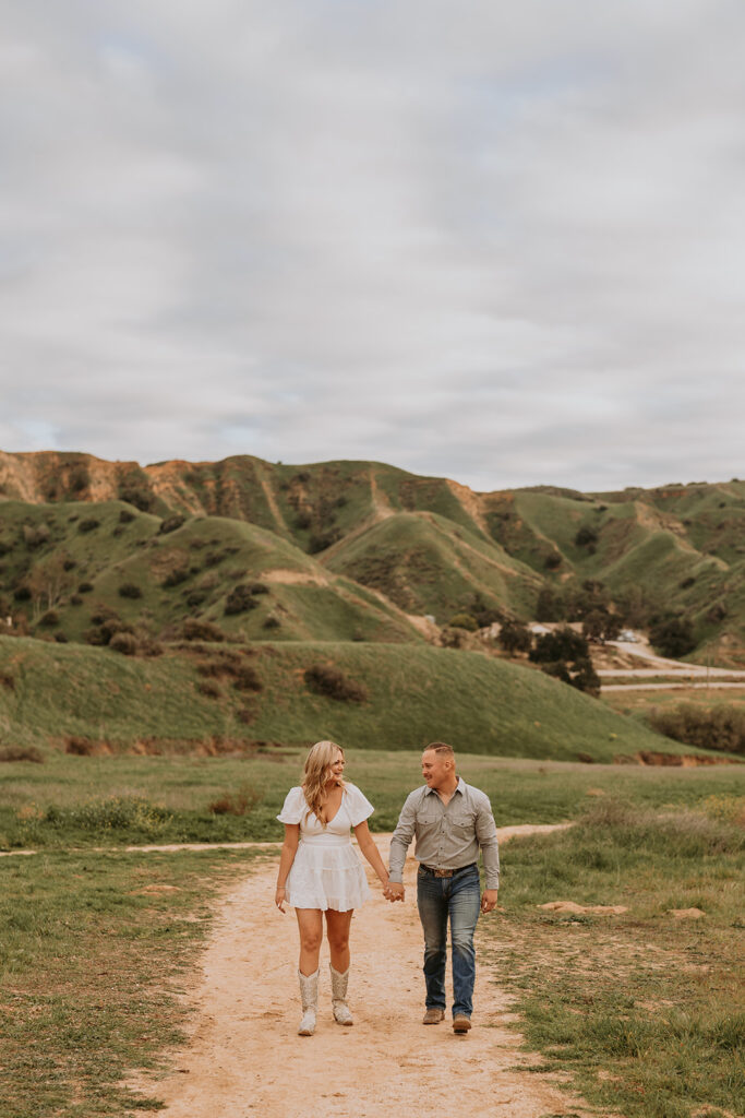 couple posing for their engagement photoshoot in redlands california