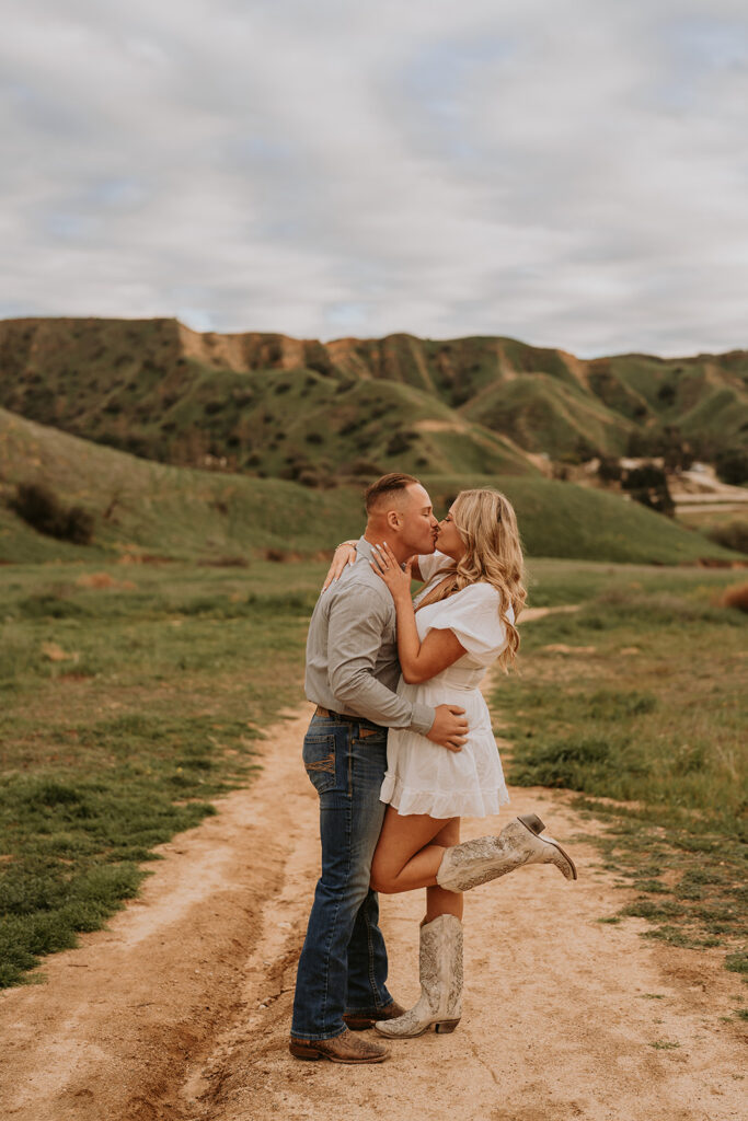 couple posing for their engagement photoshoot in redlands california