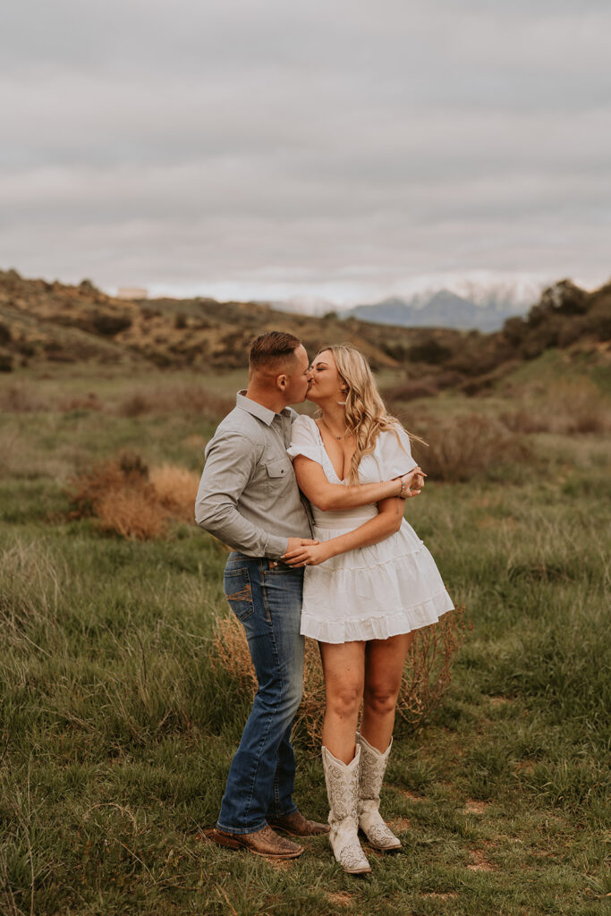 couple posing for their engagement photoshoot in redlands california