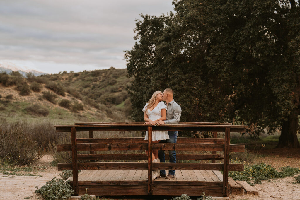 couple posing for their engagement photoshoot in redlands california