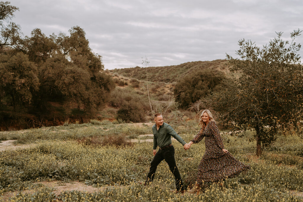 couple posing for their engagement photoshoot in redlands california