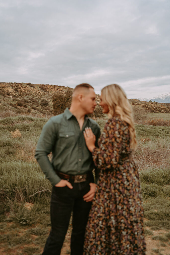 couple posing for their engagement photoshoot in redlands california