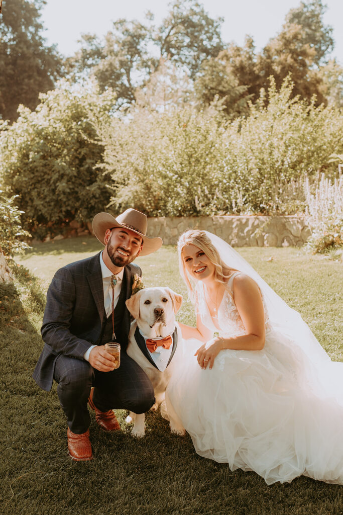 Bride and Groom with their dog
