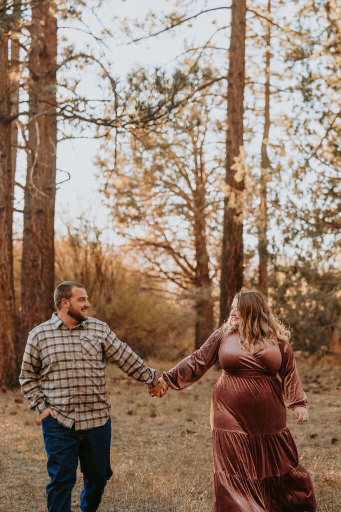 couple walking for fall engagement session