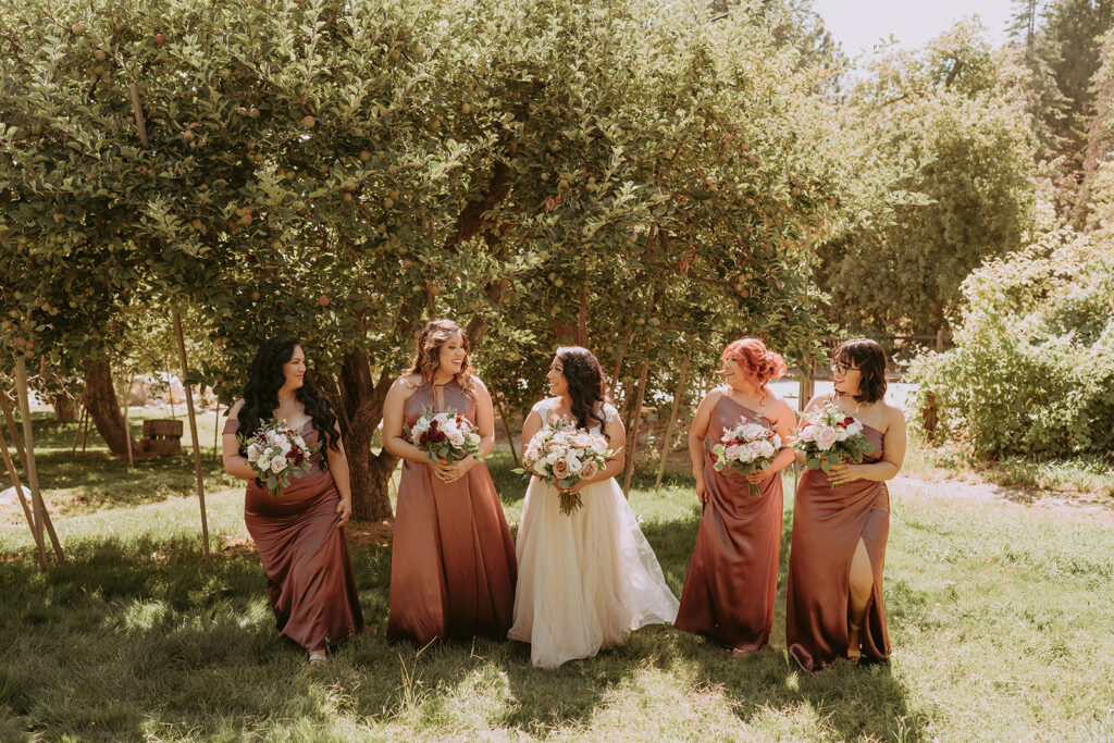 Bride with Bridesmaids outside
