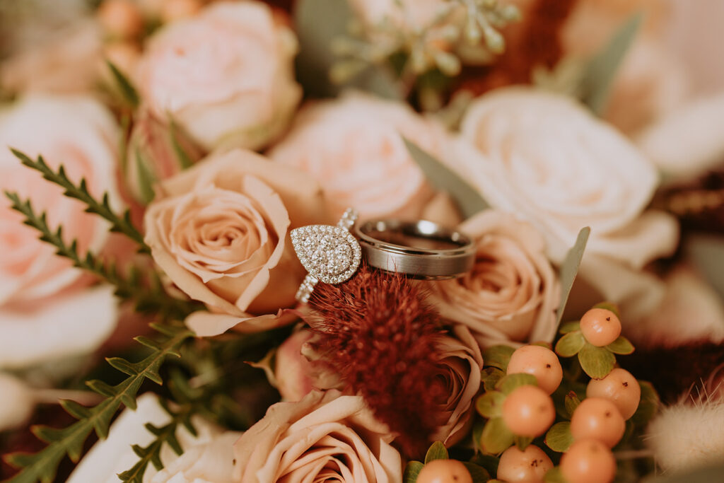 wedding rings and florals