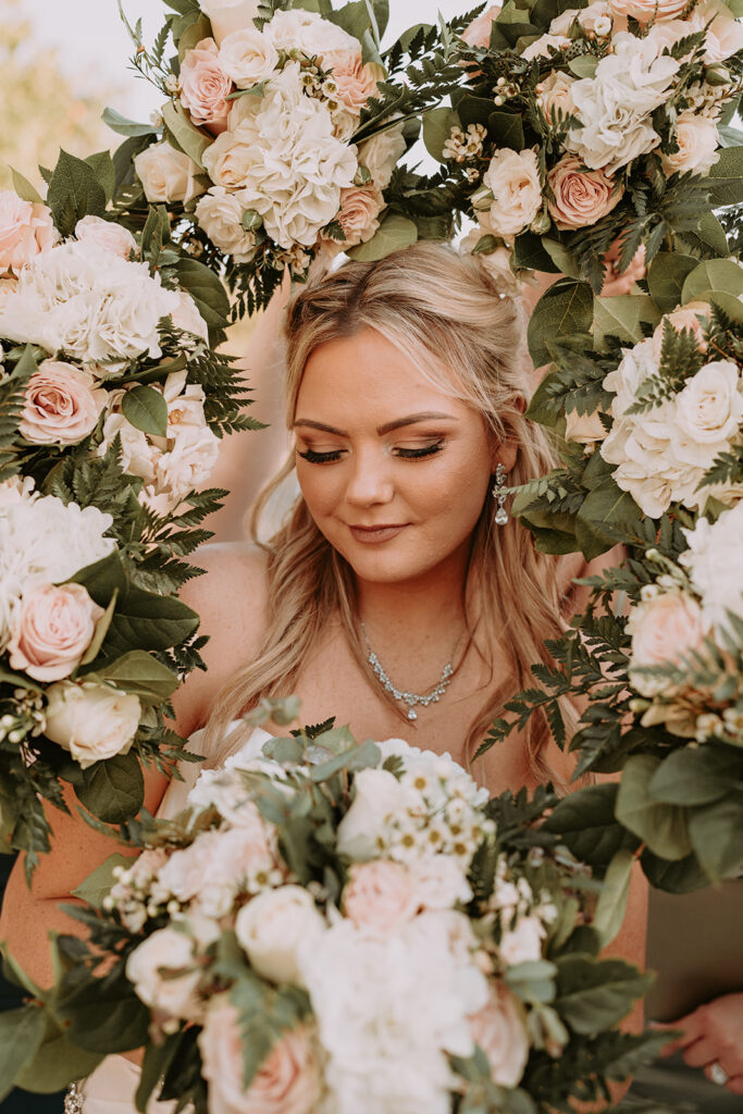 bride surrounded by bouquets. Southern California Wedding Florists