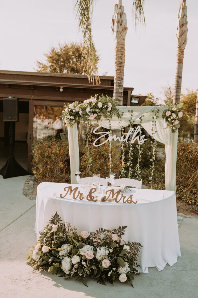 Wedding entry table and florals