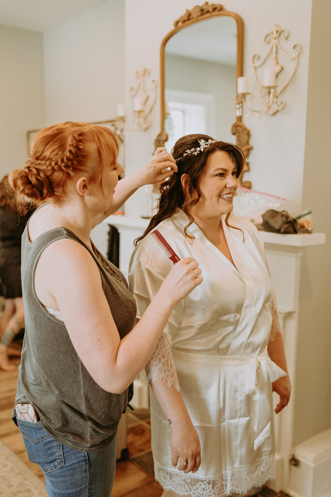 bride getting her hair done at the barton house in redlands