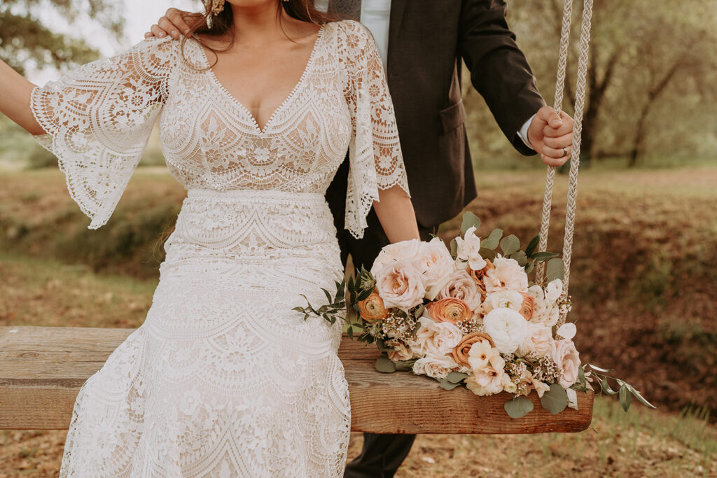 close up from wedding dress and bouquet