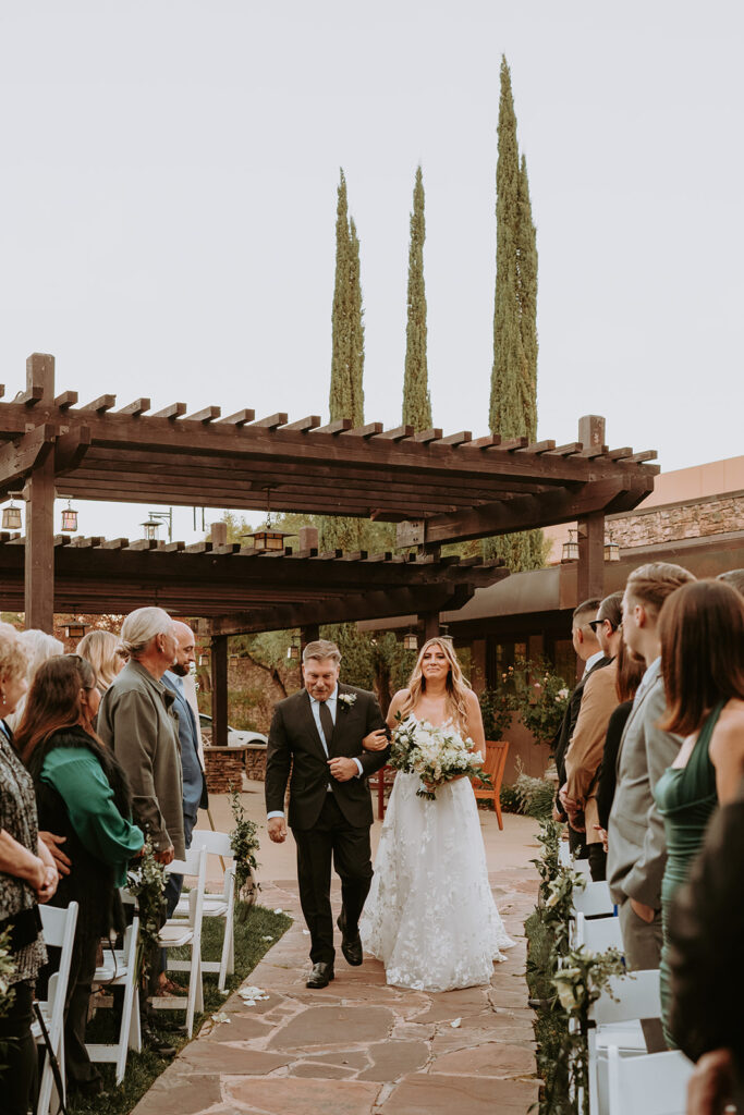 Bride walking down the aisle at Temecula wedding ceremony