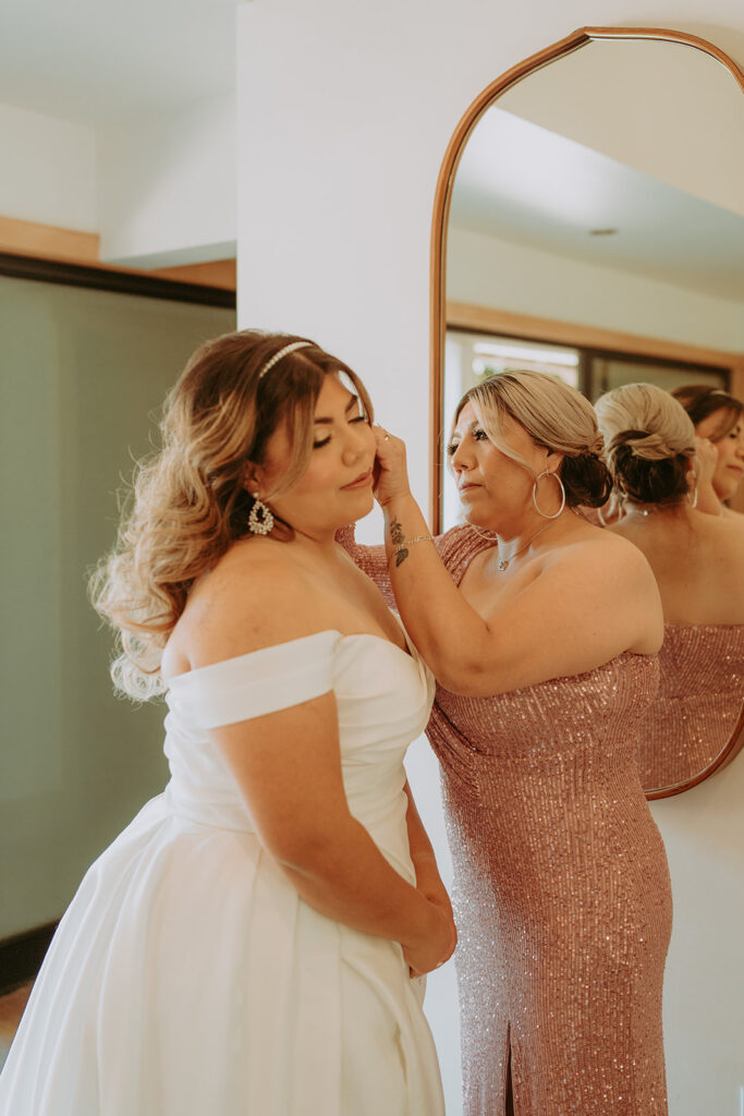 bride getting ready with her bridal party