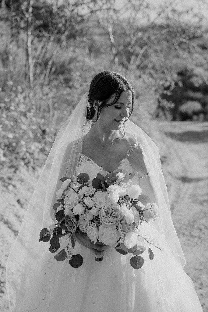 Black and white photos of a bride with a bouquet