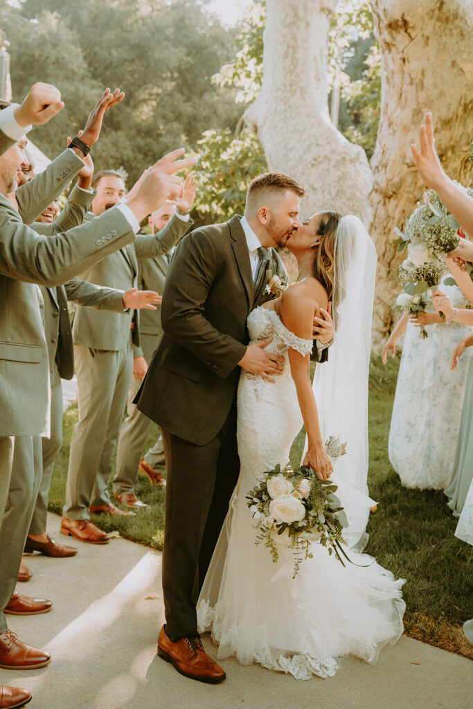 bride and groom walking with their bridal party at an oak glen wedding venue