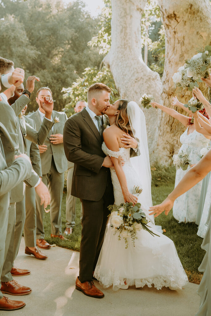 bride and groom walking with their bridal party at an oak glen wedding venue