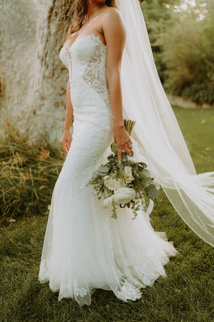 portrait of a bride outside with her bouquet