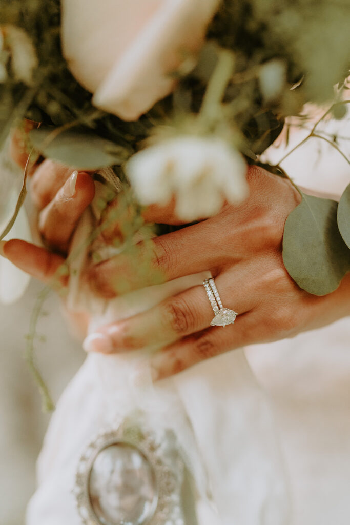 close up of a bride holding a bouquet