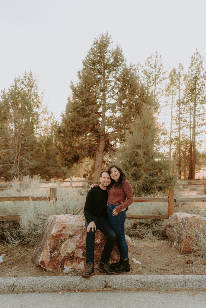 close up of newly engaged couple in the forest