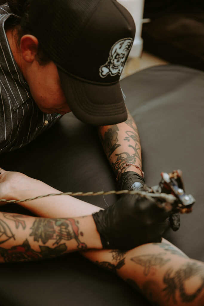 Orange Street Tattoo artists in action at wedding reception