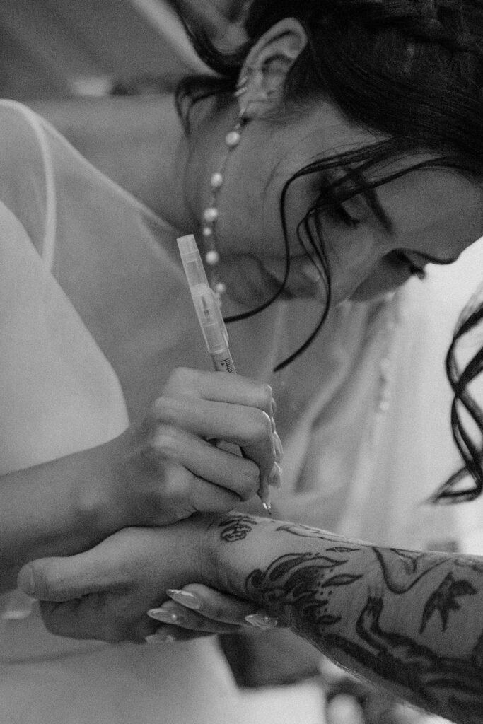 Orange Street Tattoo artists in action at wedding reception